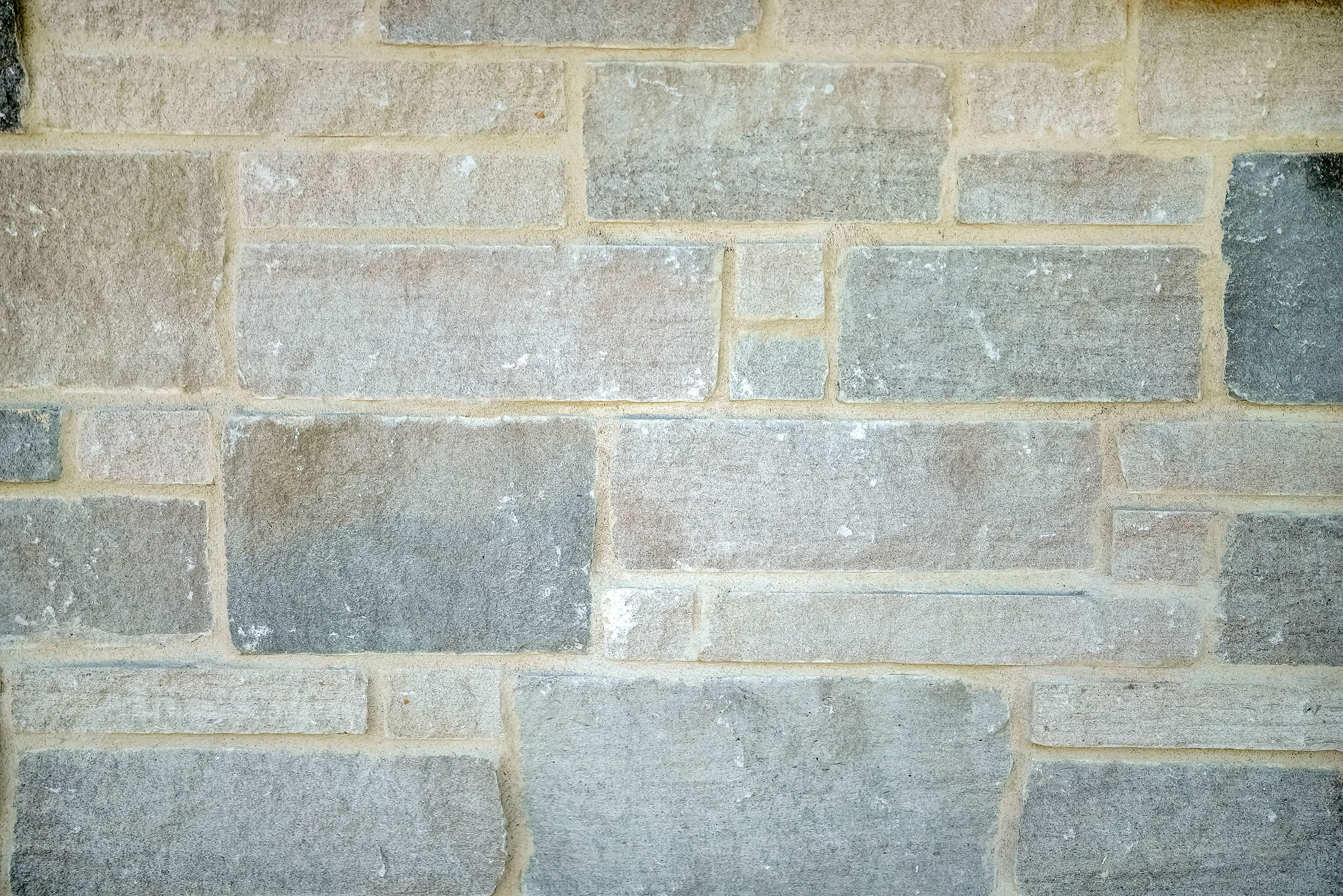 Close-up of gray stone brick wall