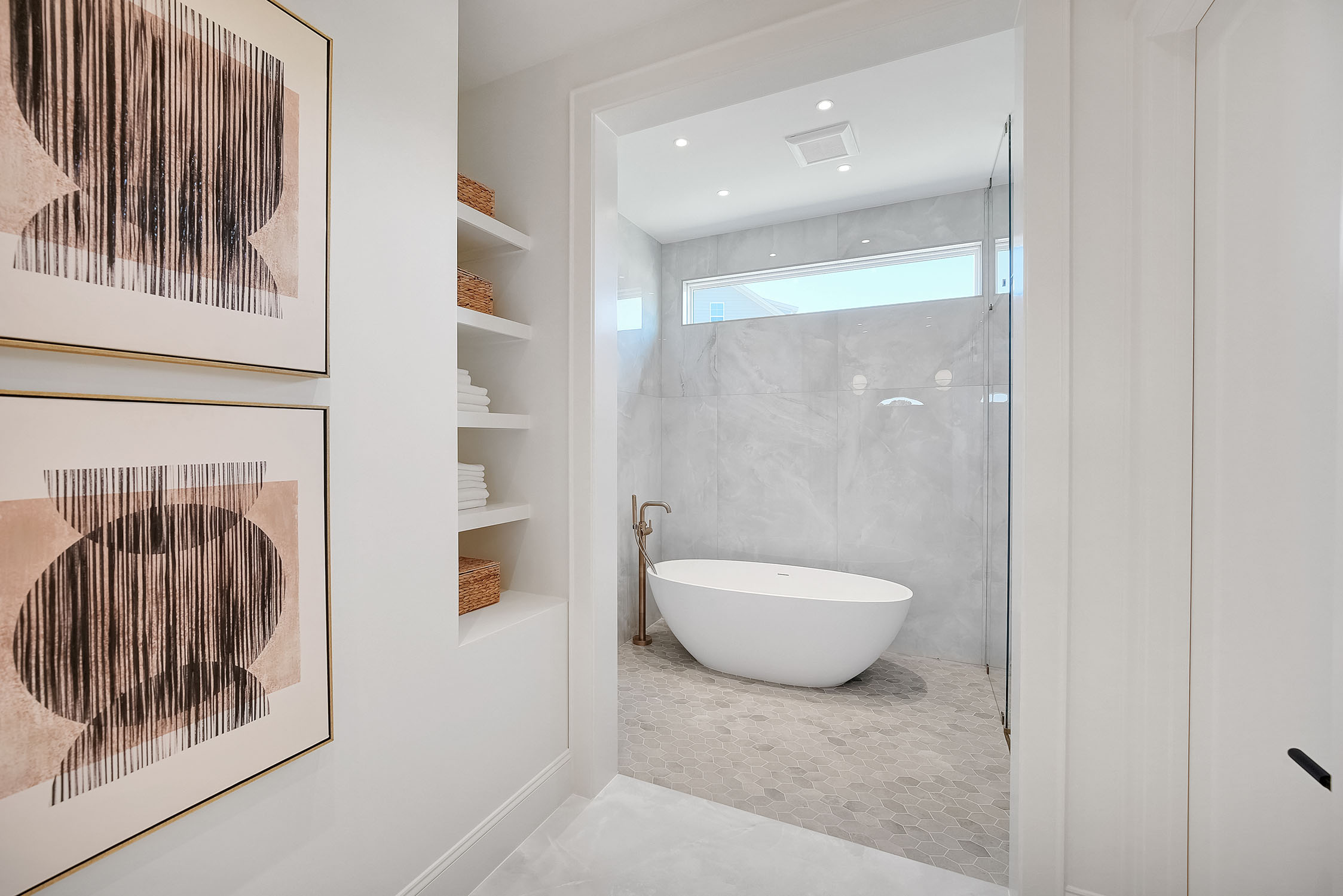 Modern bathroom with freestanding tub and glass shower