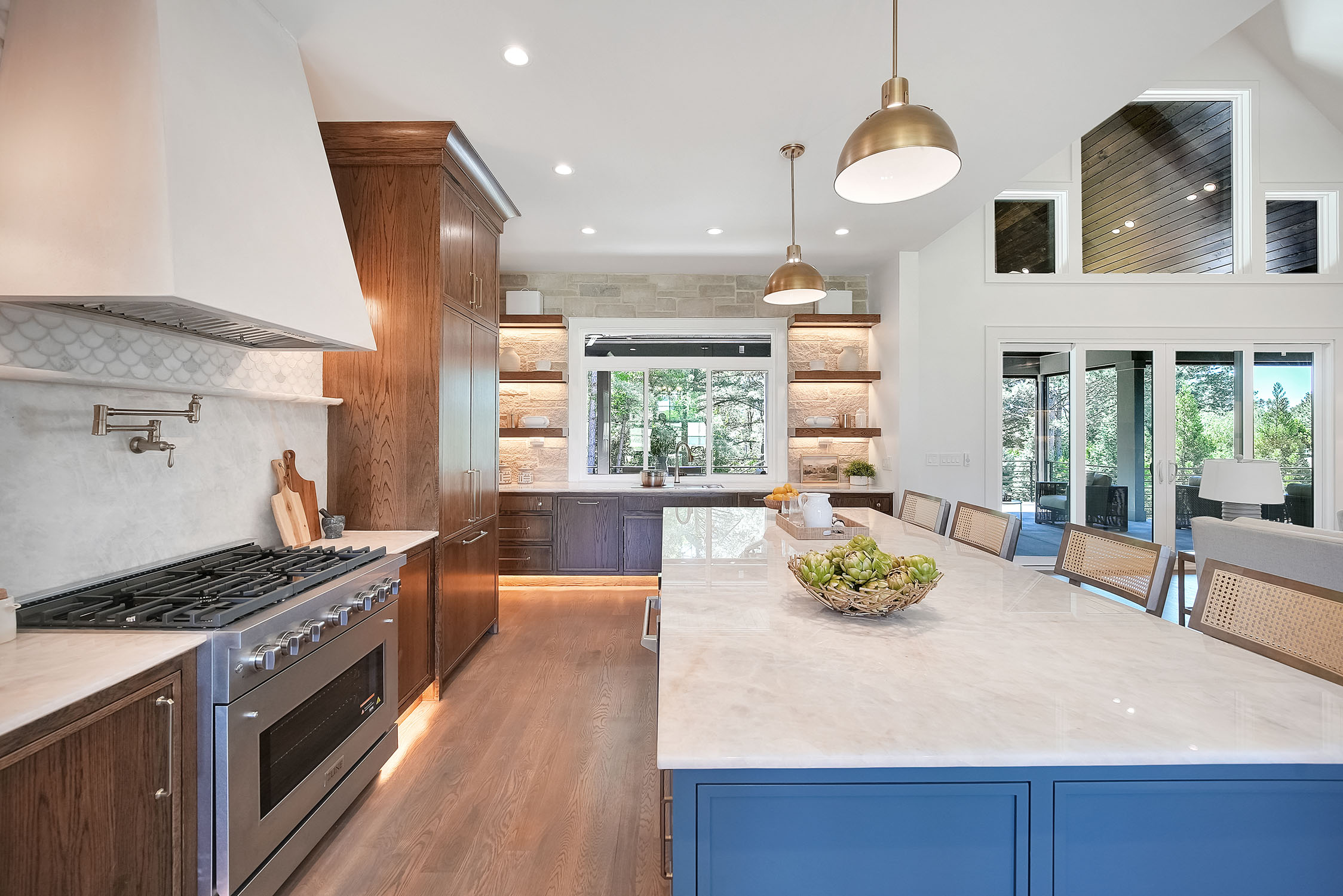Modern kitchen with large island and wood cabinetry