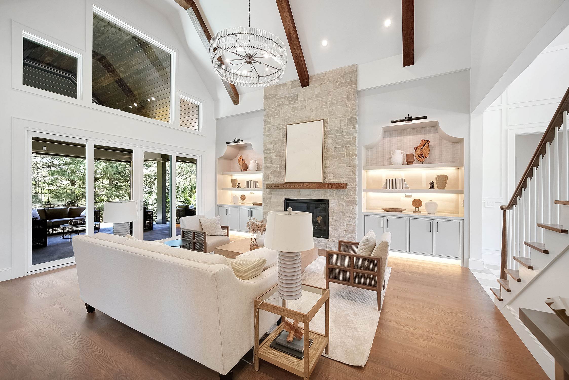 Modern living room with vaulted ceiling and fireplace