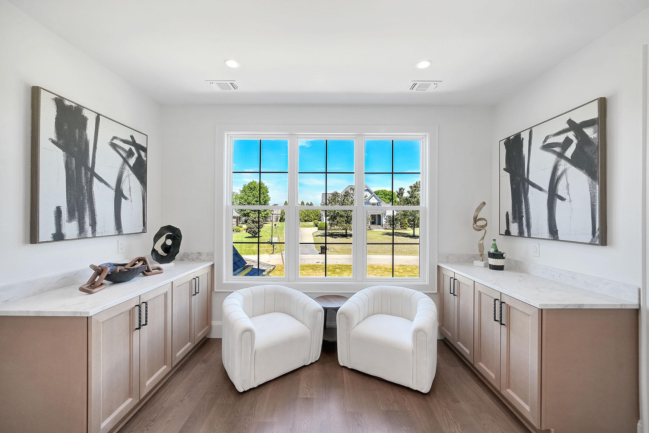 Bright modern sitting nook with large window