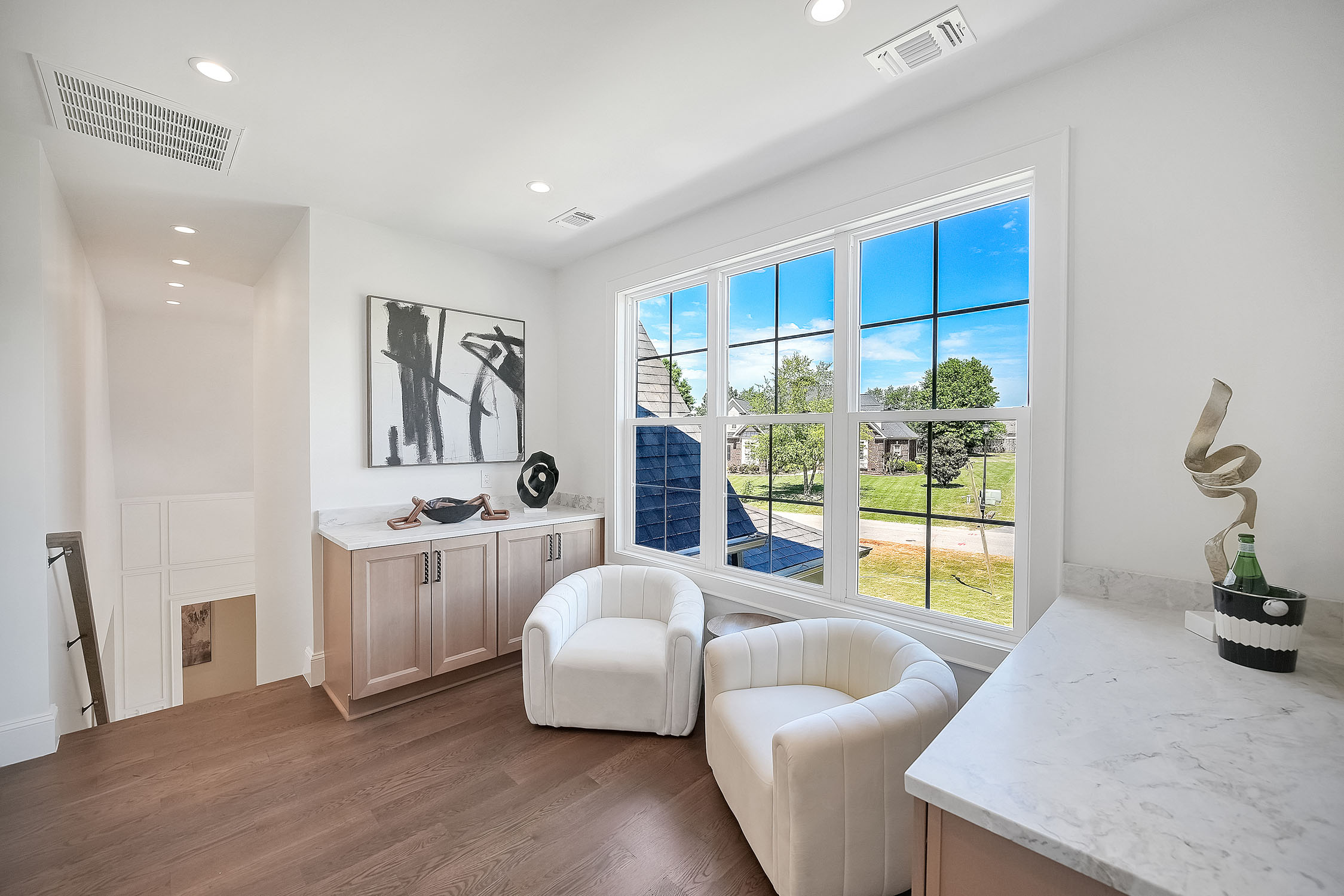 Bright modern sitting area with large windows