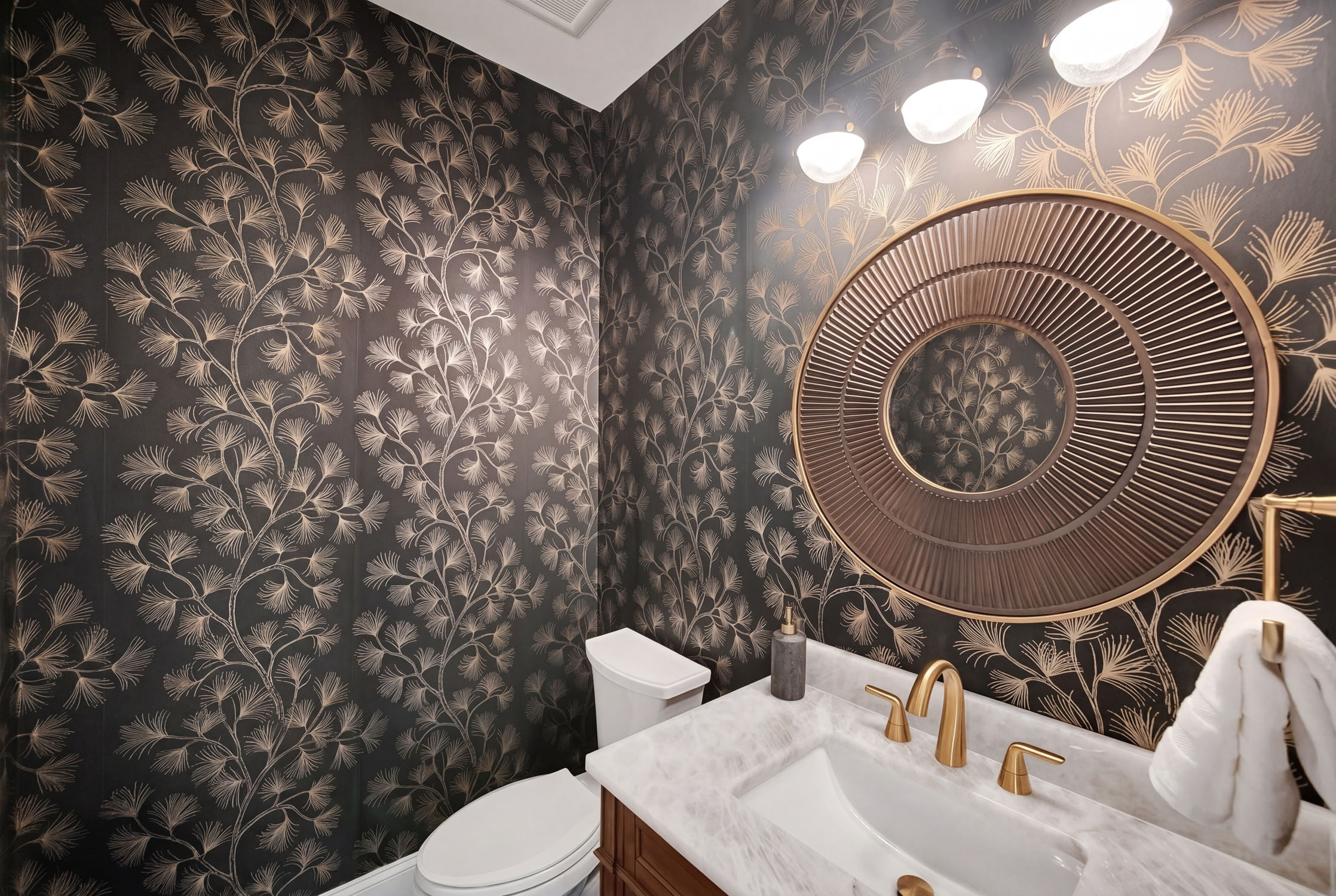 Elegant bathroom with dark floral wallpaper and gold accents