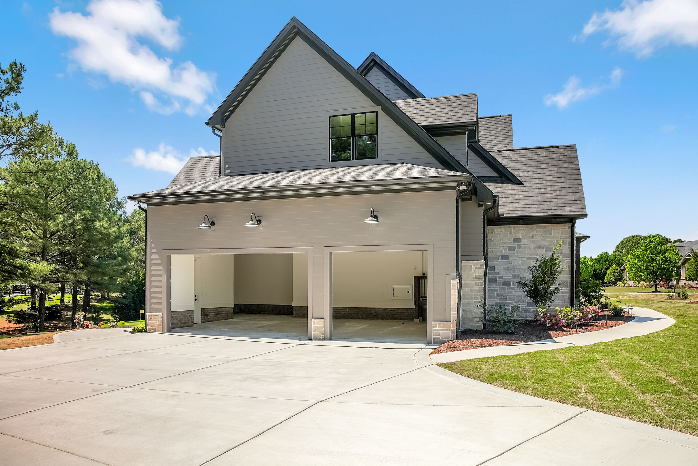 Modern home exterior with three-car garage