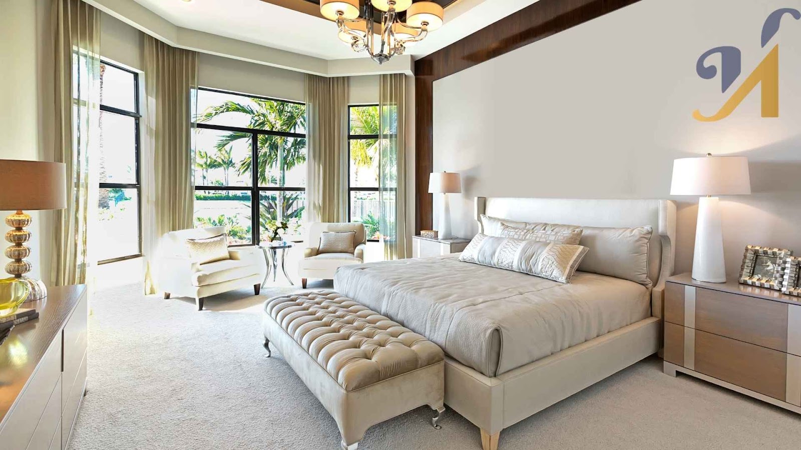 Luxurious master suite bedroom with large windows and elegant decor.