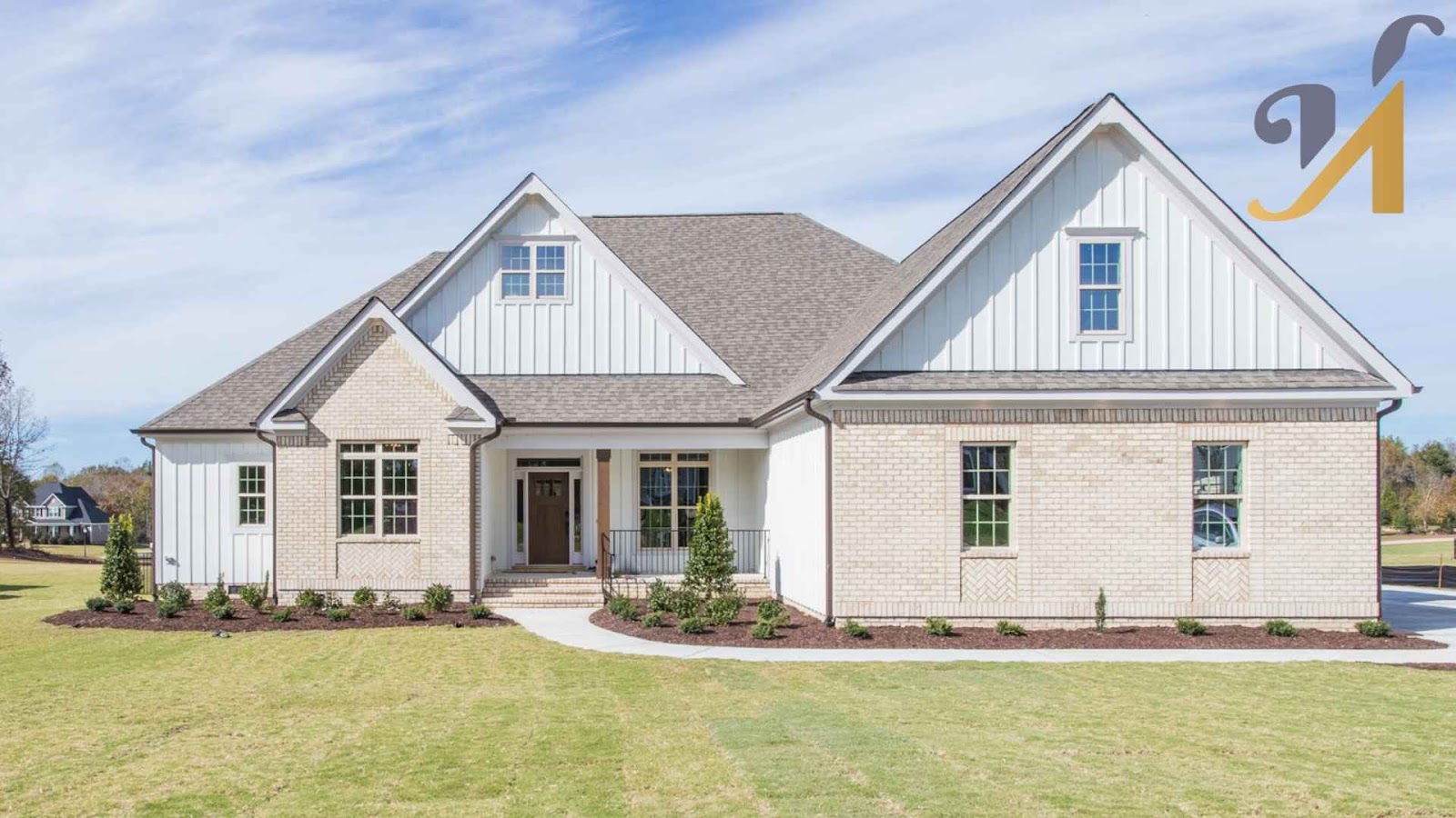 Modern suburban house with landscaped front yard.