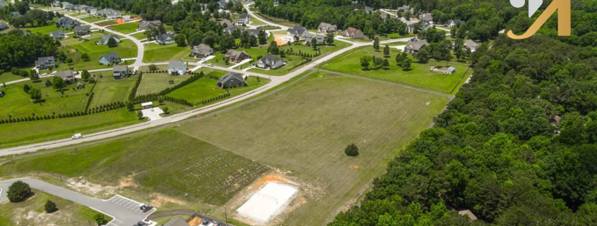 Aerial view of a suburban neighborhood with pool.