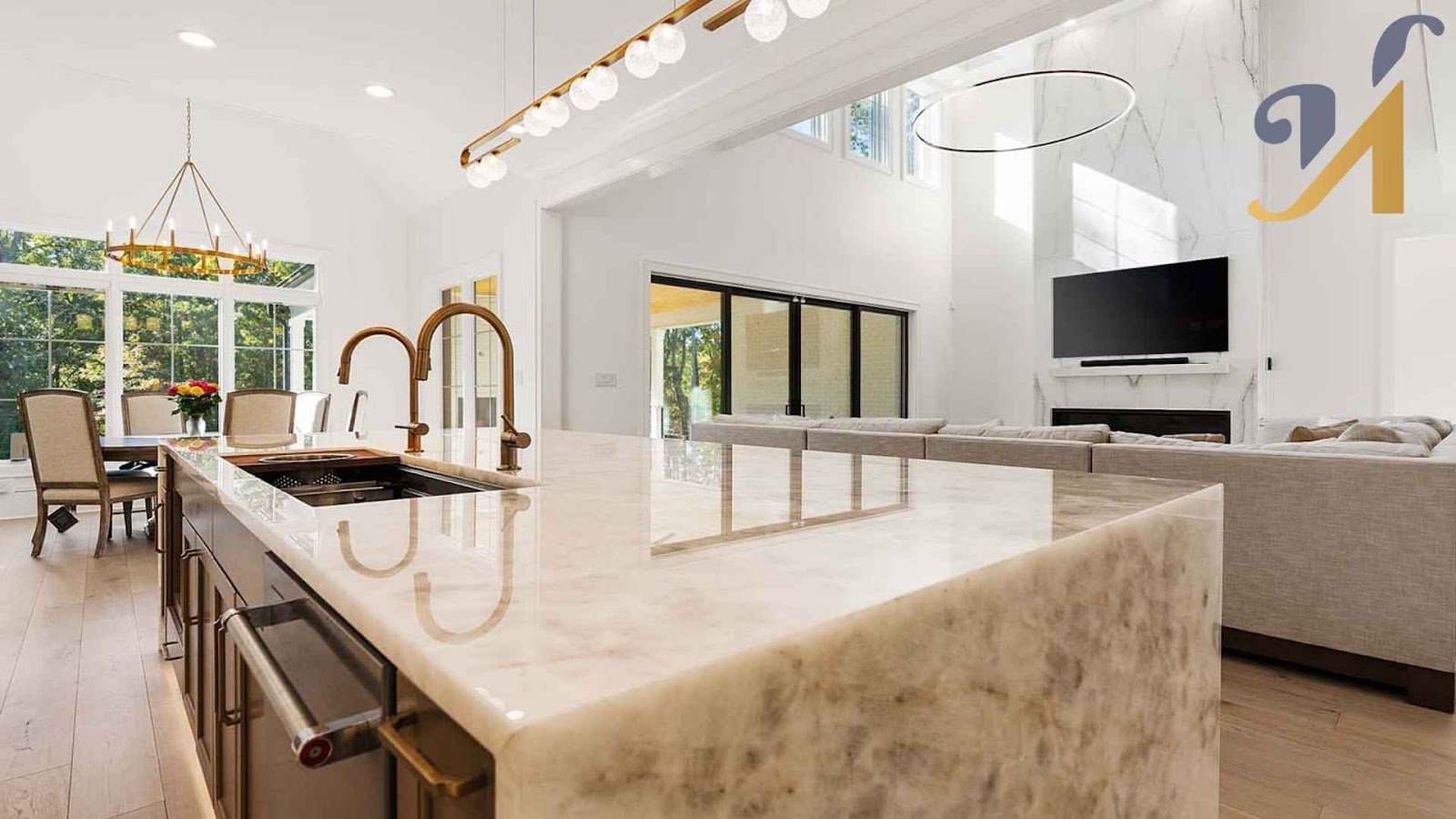 Modern kitchen countertop with elegant lighting and marble island.