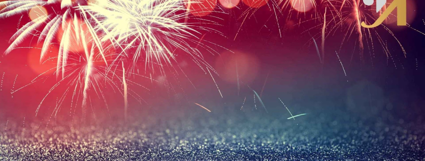 Colorful fireworks exploding in the night sky.