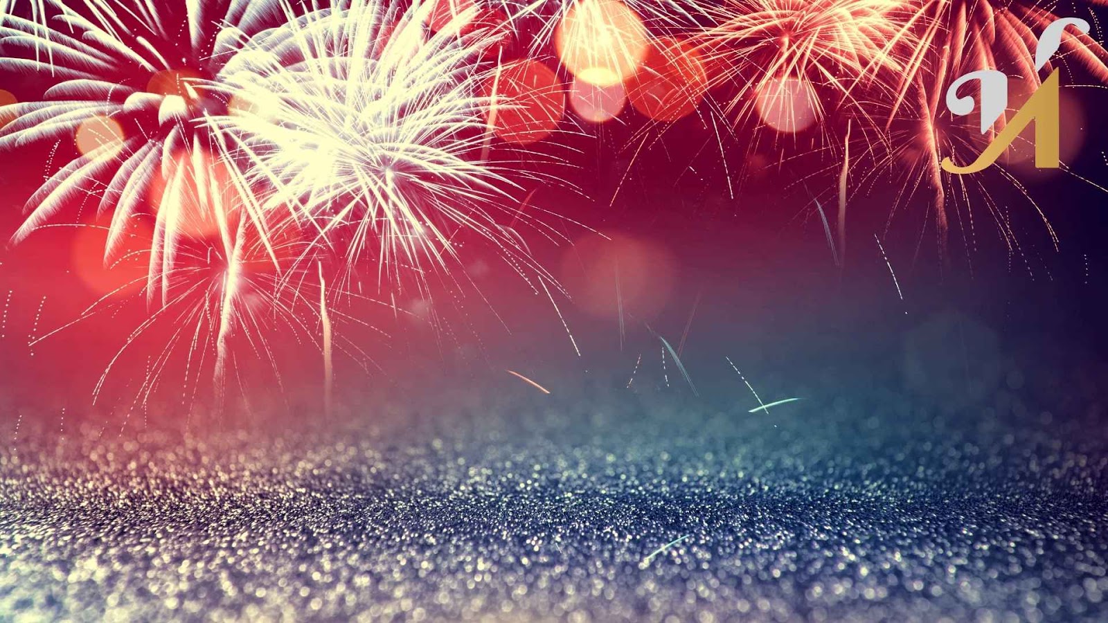 Colorful fireworks exploding in the night sky.