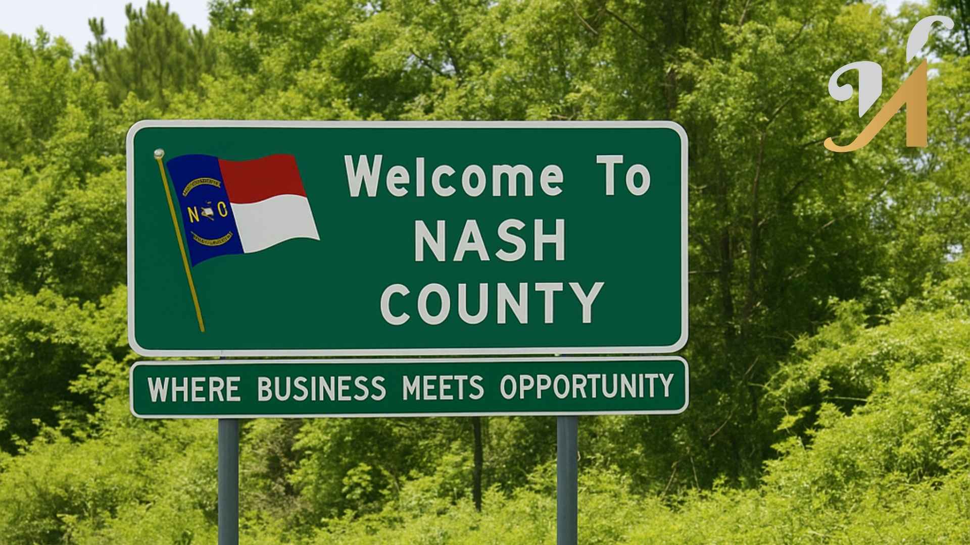 Nash County welcome sign with NC flag.
