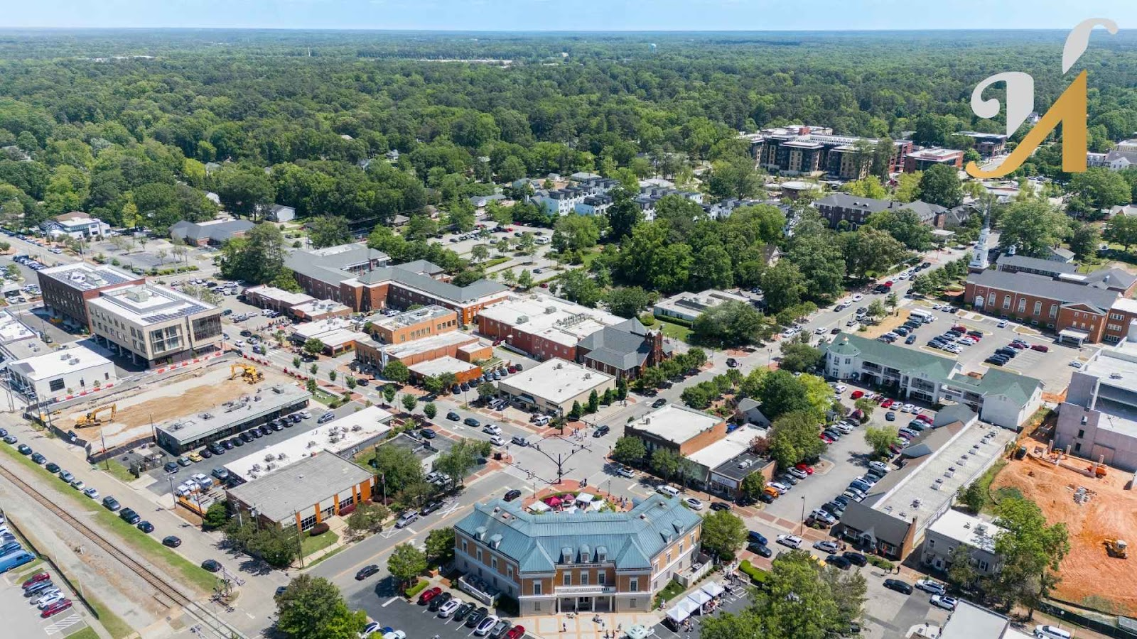an aerial view of downtown cary, nc, where there is a demand fro custom homes